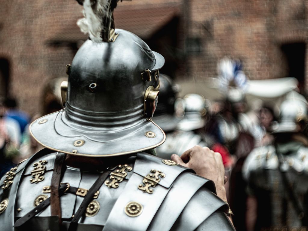 Close-up of a knight in armour, wearing a helmet to protect his mind and head. This represents the helmet of salvation through Jesus Christ.