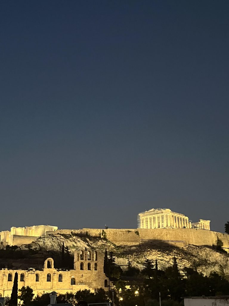 Night time views of the Acropolis from a rooftop restaurant in Athens.