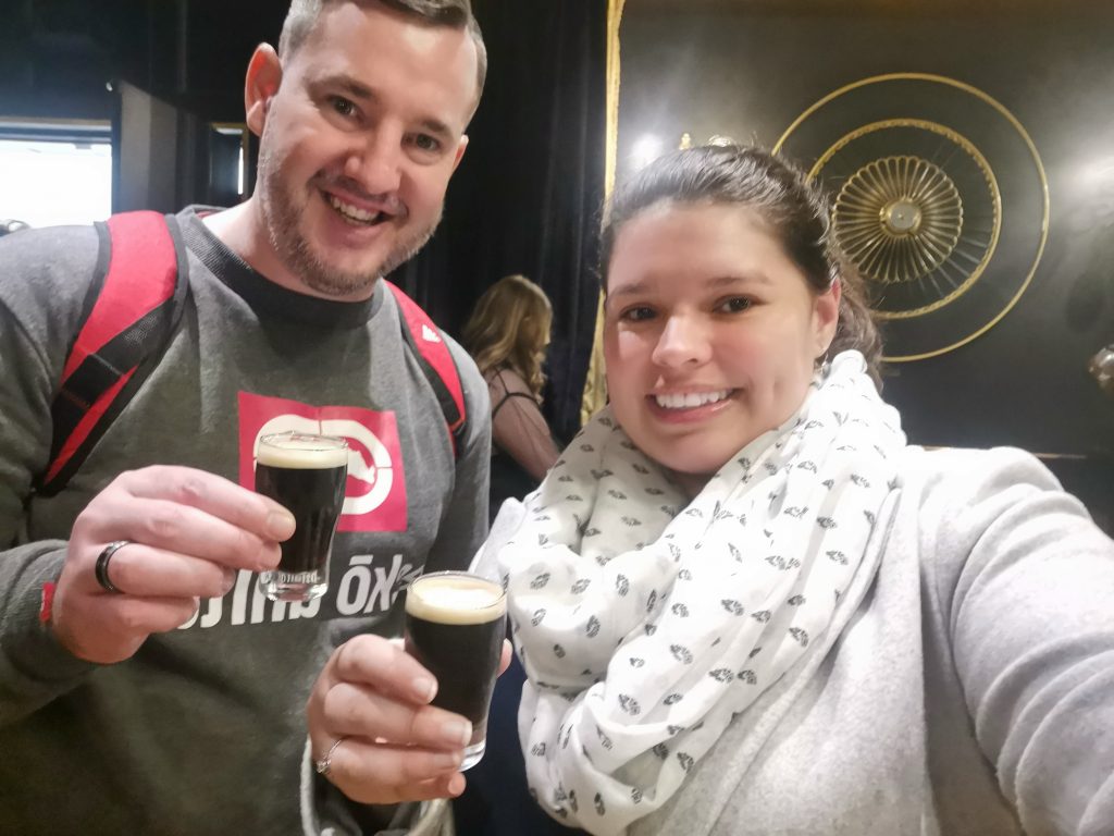 Happy couple at the Guinness factory in Dublin, Ireland. 